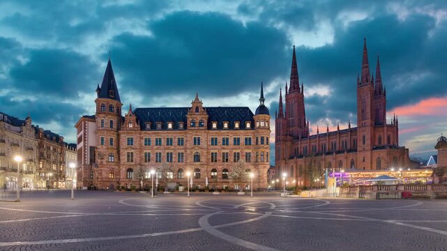Wiesbaden, Germany - view of Marktplatz square with New Town Hall and Marktkirche church at dusk (static image with animated sky)