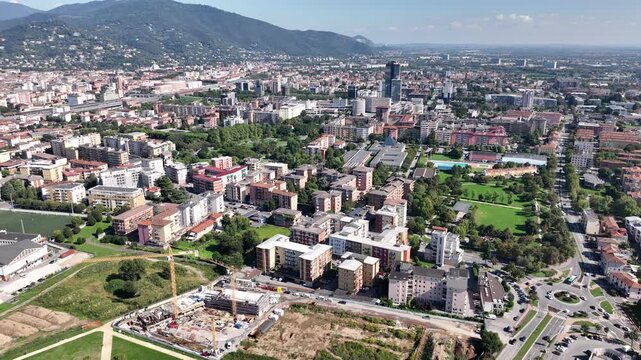 Reverse aerial brescia italy skyline town