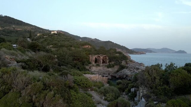 The scenic views of Aytap (iotape) is popular for camping, swimming in the natural caves, the local beaches, and the ancient ruins, located east of Alanya, in the Mediterranean Region, Turkey. 
