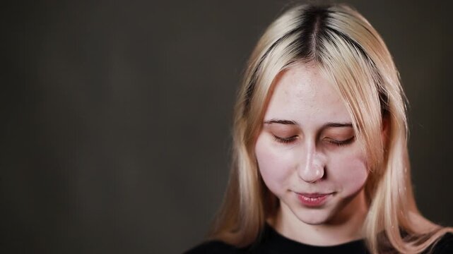 Emotional face of a girl, expression of different emotions