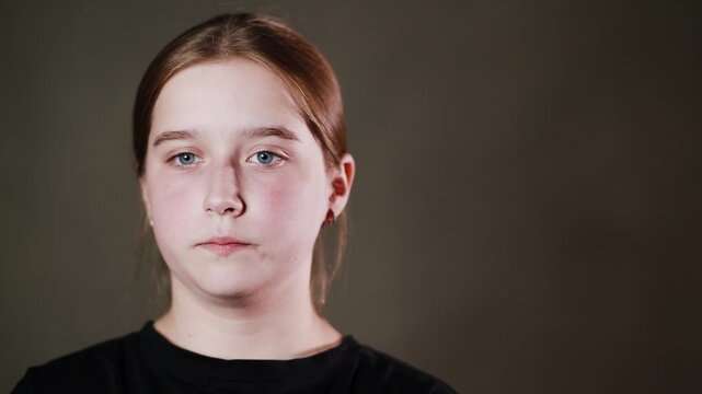 Emotional face of a girl, expression of different emotions