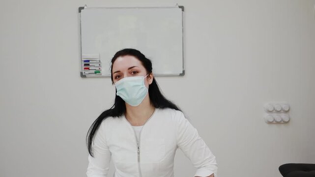 A female cosmetologist is preparing for a procedure