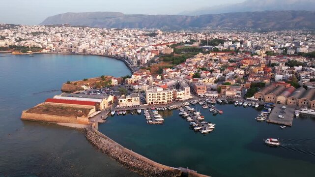 Beautiful Old city, Greece and best scenic places - panorama of picturesque old town Chania. Crete island, Panoramic of the old Venetian port and lighthouse during the blue hour, Travel Concepts