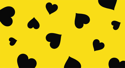 Fototapeta premium Bright yellow background with scattered black heart shapes creating a playful and romantic pattern