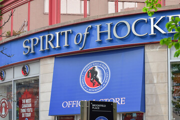 Naklejka premium Facade of Spirit of Hockey retail store in downtown Toronto, featuring storefront architecture and hockey themed branding near the Hockey Hall of Fame, May 2026