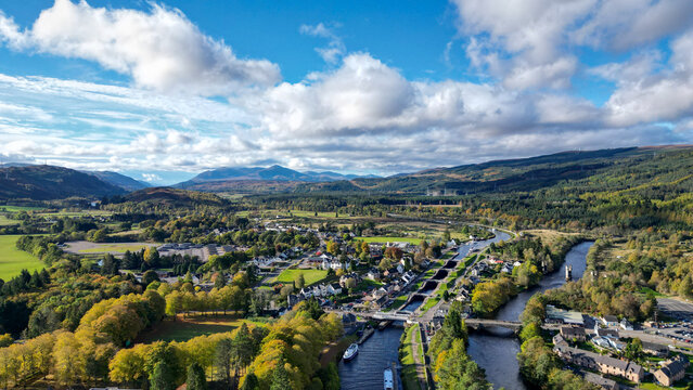 Aerial Drone Shot of Scenic Countryside Town and River with Lock Chambers and Boats at Fort Augustus in the Parish of Boleskine and Abertarff, South‑West End of Loch Ness, Scotland