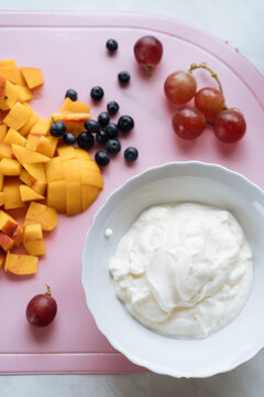 Dairy near collection of fresh fruits