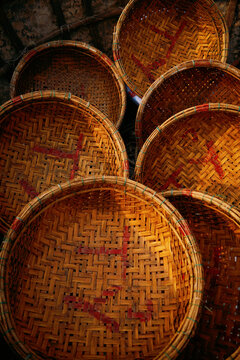 Bamboo baskets displayed in a vibrant market in Vietnam