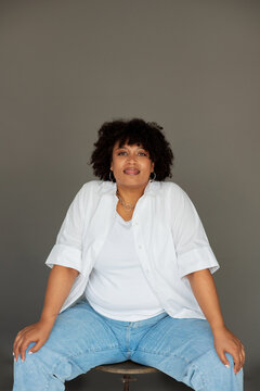 Portrait of young woman looking at camera.