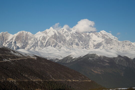 Distant View of Mount Everest Summit Wrapped in Clouds