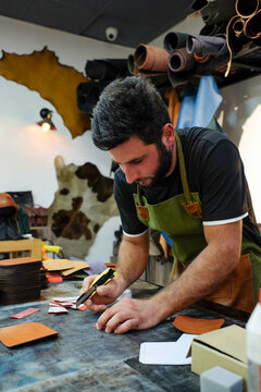 Focused Craftsmanship in a Textile Workshop

