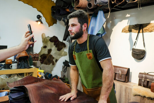 Focused Craftsmanship in a Textile Workshop

