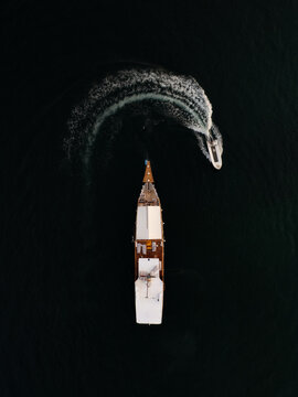 Aerial View of Yacht with Speedboat