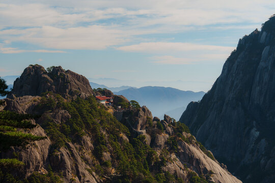 Scenic view of temple in  Huangshan mountains in China at sunset  