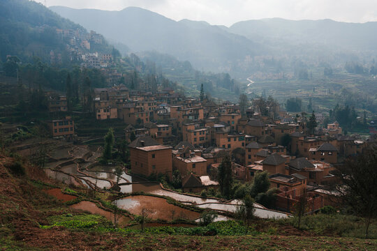 Scenic view of rice terraces reflecting sky in Yunnan, China 