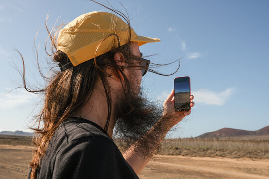 Man Photographing the Landscape