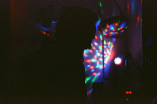 Silhouette in front of lightings