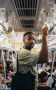 Passenger in Tokyo subway car