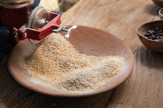 Grinding Corn into Flour with Traditional Mill