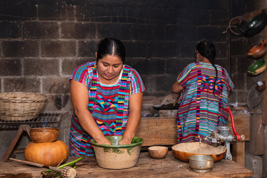 Women Cooking Traditional Food in a Kitchen