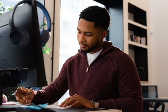 Focused man working at office