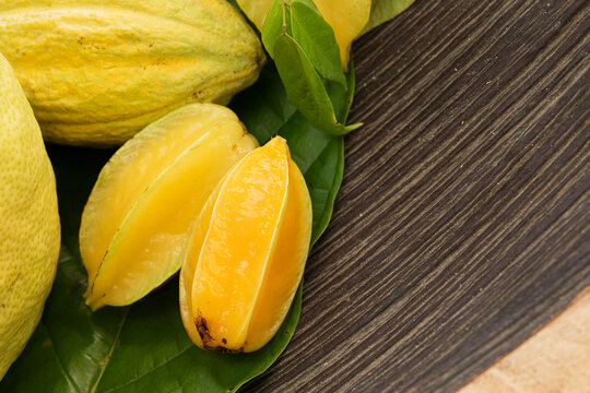 Starfruit Displayed Among Lush Greenery