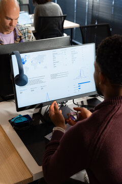 Man analyzing data at office 