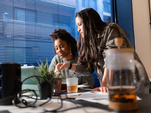 Woman expressing her opinion about a project to colleague 