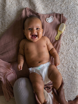 Baby Enjoys Massage on Soft Blanket 