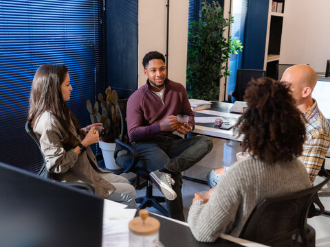Group Discussion in a Modern Office at Midday