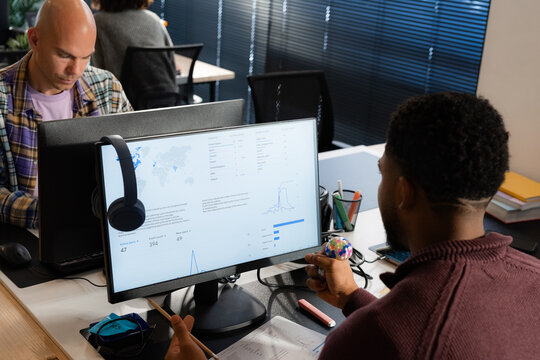 Data analyst working at office 