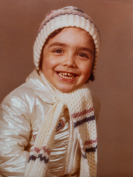 Studio portrait of joyful toddler in the late 1970s