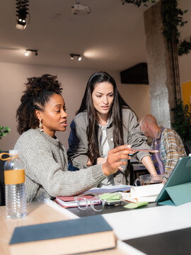 Focused women working together on a project at office 