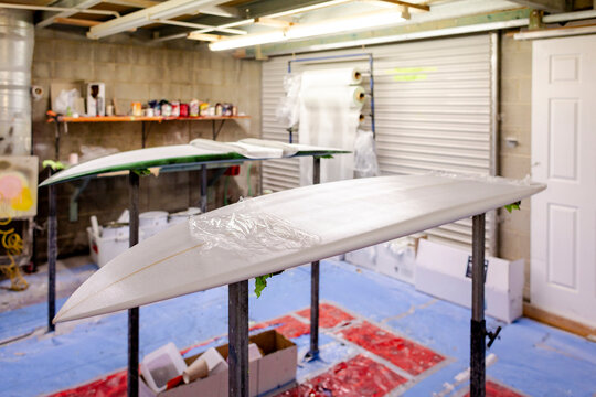 Surfboards curing in glassing room in  Australia