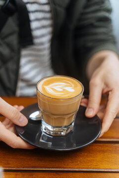 Glass of latte with heart latte art