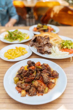 Traditional Turkish meat dishes served outdoors