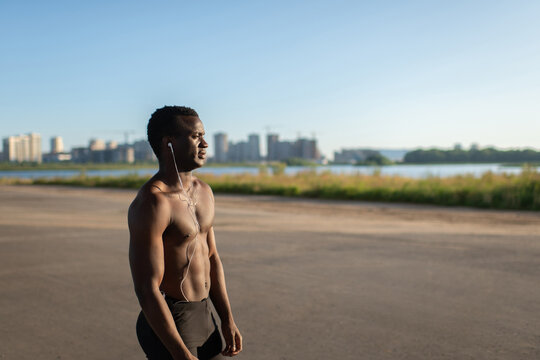 Fit male having break while running