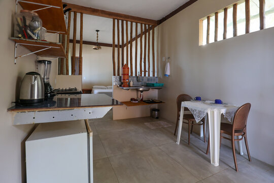 Kitchen With Dining Area in seaside Brazilian house