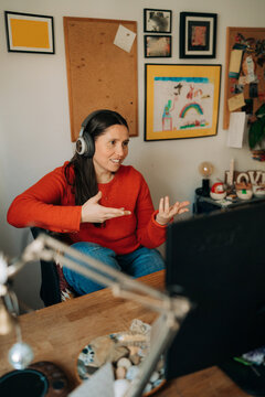 Woman Gesturing During Online Video Meeting