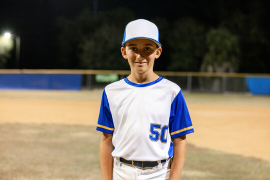 Baseball Player Posing Under Lights