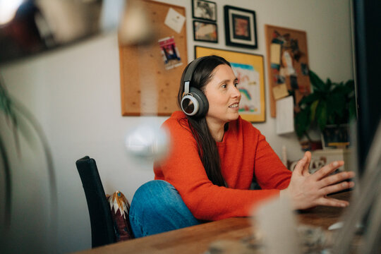 Woman listening attentively during video call