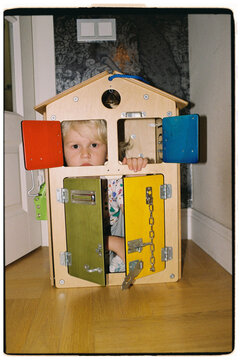 The boy hid in the playhouse