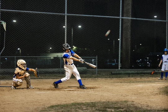 Batter in action during baseball game