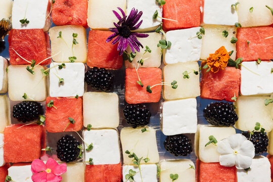 Gourmet cheese and fruit checkerboard arrangement - overhead angle