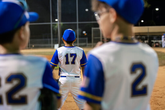 Baseball Players focus on Teammate During a Game