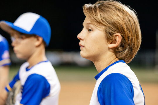 Baseball Players Focus During Night Game