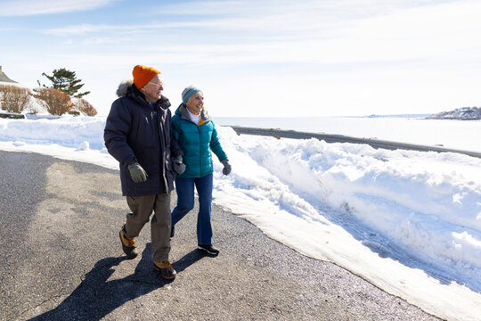 Senior couple winter walk together