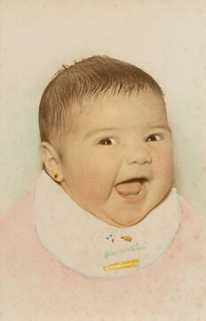 Happy baby smiling in vintage 1970s portrait