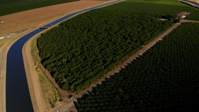 Drone view of a River running through farmland in Modesto, California