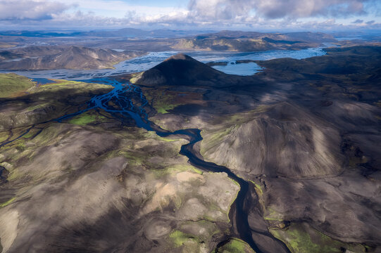 High aerial of volcanic cones, rivers and lakes, F208 Iceland
